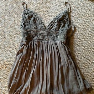 Never worn, tags still on. Olive green summer romper.